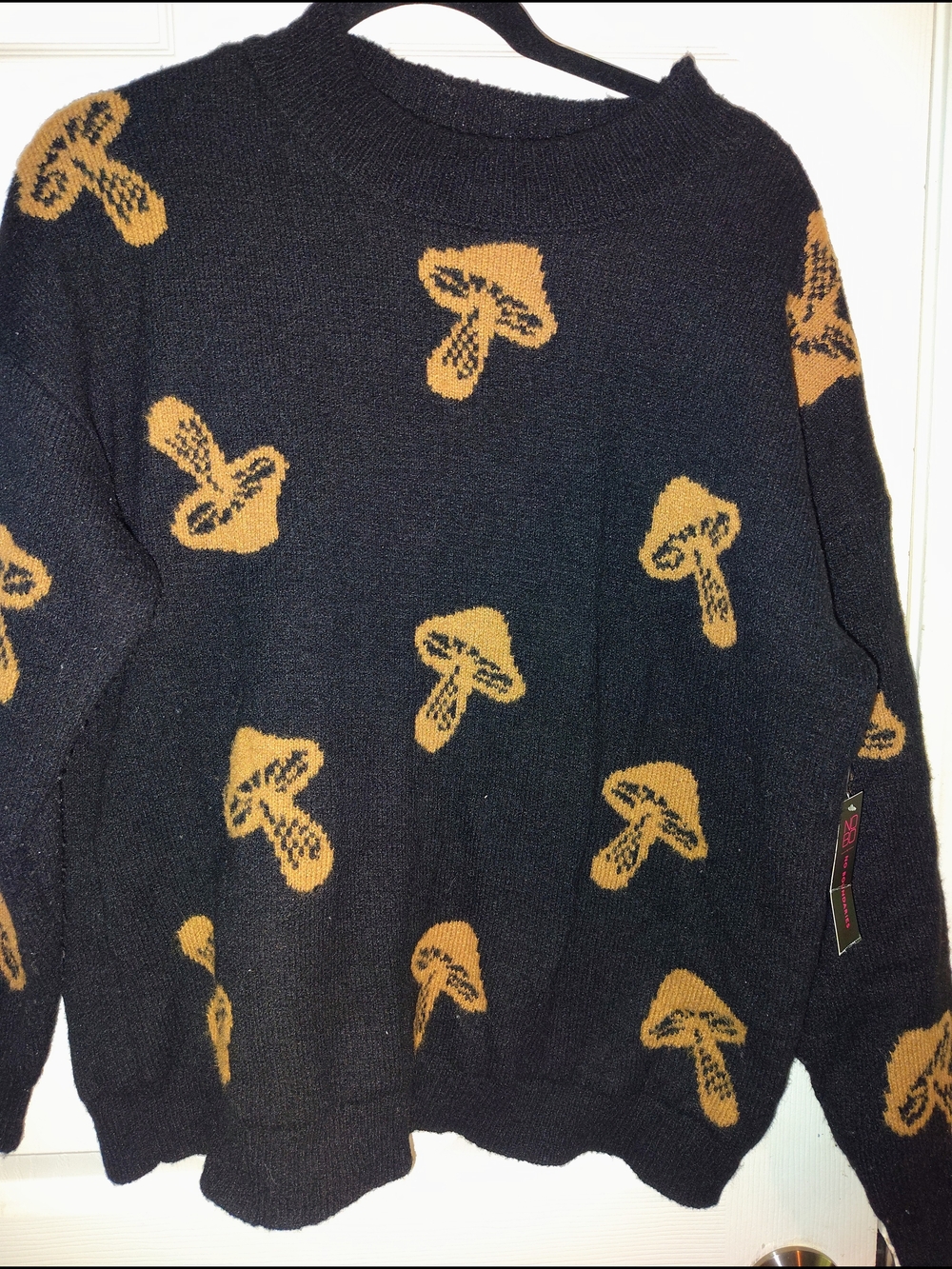 No Boundaries Black Crewneck Sweater with Gold Mushroom Pattern